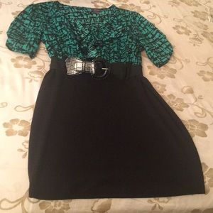 Dots black and dress with ruffles at the front